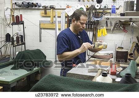 Stock Image - Traditional shoemaker workshop. Fotosearch