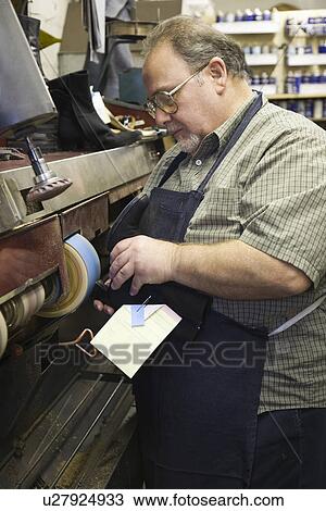 Stock Image - Traditional shoemaker workshop. Fotosearch