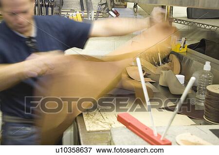 Traditional shoemaker workshop View Large Photo Image Stock Photo - Traditional shoemaker workshop. Fotosearch