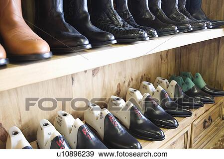 Stock Photo - Traditional shoemaker workshop. Fotosearch
