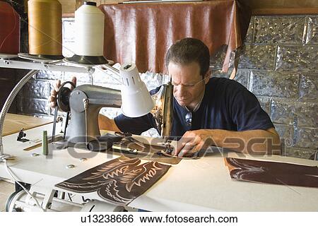 Stock Photograph - Traditional shoemaker workshop. Fotosearch