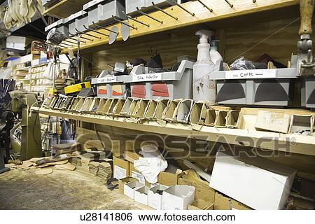 Stock Photograph - Traditional shoemaker workshop. Fotosearch