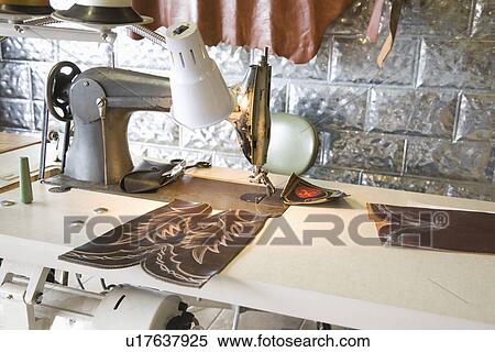 Stock Photography - Traditional shoemaker workshop. Fotosearch
