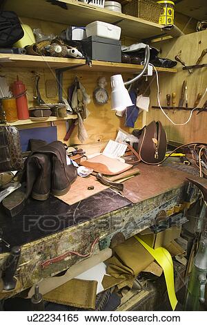 Stock Photography - Traditional shoemaker workshop. Fotosearch