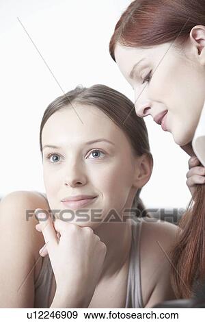 Stock Photo - Two young women with flawless skin. Fotosearch