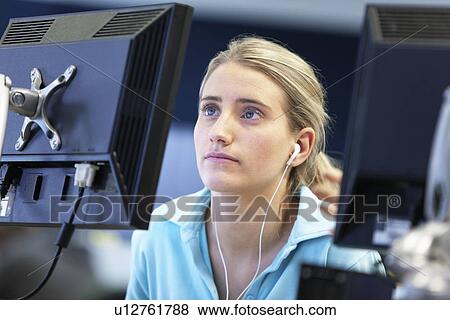 Stock Photo - University student using computer. Fotosearch