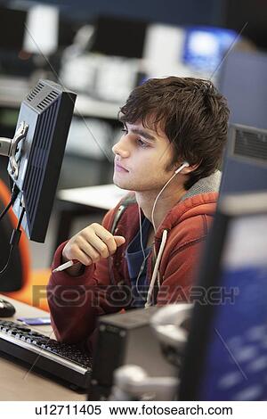 University student using computer View Large Photo Image Stock Photography - University student using computer. Fotosearch