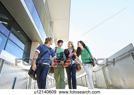 University students on campus View Large Photo Image Stock Photo - University students on campus. Fotosearch