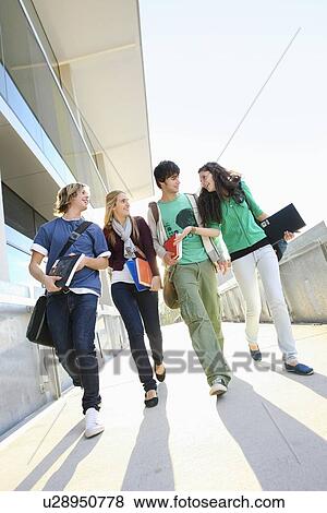 University students on campus View Large Photo Image Stock Photo - University students on campus. Fotosearch