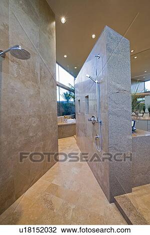 Stock Image - Walk-in shower of Palm Springs home. Fotosearch