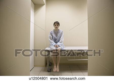 Woman waiting for medical examination View Large Photo Image Stock Image - Woman waiting for medical examination. Fotosearch