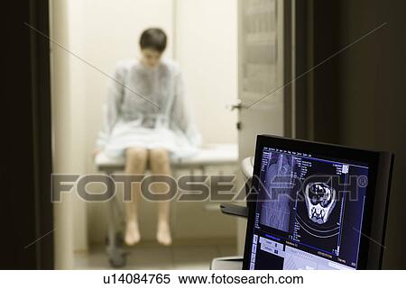 Stock Photography - Woman waiting for medical examination. Fotosearch