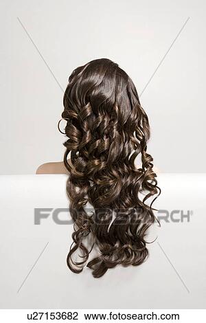 Woman With Long Brown Curly Hair Rear View Stock Image U27153682