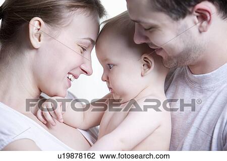 Stock Image - Young family with toddler son. Fotosearch