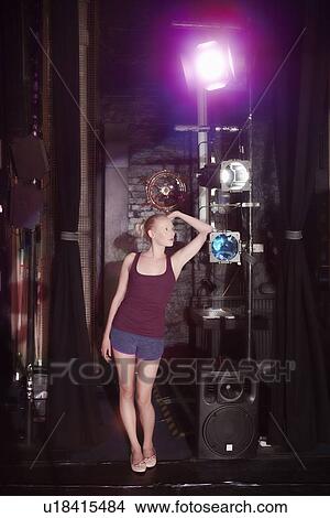 Picture - Young woman backstage. Fotosearch