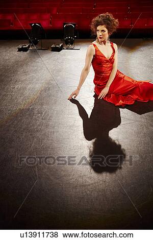 Young woman on stage View Large Photo Image Stock Photo - Young woman on stage. Fotosearch
