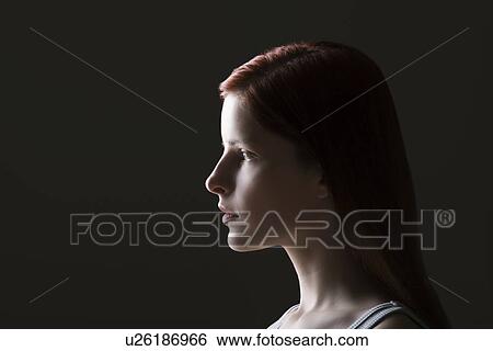 Young woman side view portrait View Large Photo Image Stock Photograph - Young woman side view portrait. Fotosearch