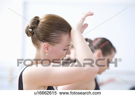 Young women exhausted from ballet rehearsal View Large Photo Image Stock Photography - Young women exhausted from ballet rehearsal. Fotosearch