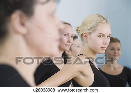 Young women in ballet rehearsal View Large Photo Image Stock Photo - Young women in ballet rehearsal. Fotosearch