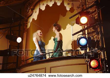 Young women in theatre box View Large Photo Image Picture - Young women in theatre box. Fotosearch