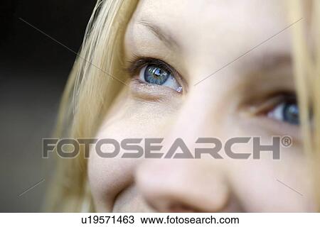 Blonde woman with blue smiling eyes View Large Photo Image Stock Image - Blonde woman with blue smiling eyes. Fotosearch