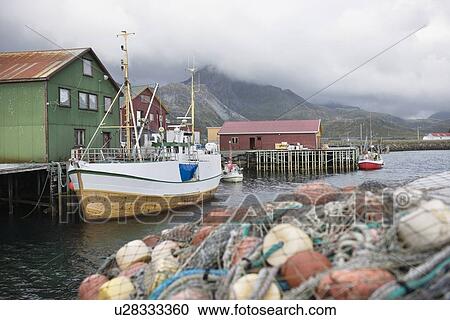 Fishing boat moored on the Lofoten Islands, Norway View Large Photo Image Stock Image - Fishing boat moored on the Lofoten Islands, Norway. Fotosearch