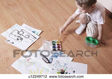 Young boy with paintbox View Large Photo Image Stock Image - Young boy with paintbox. Fotosearch