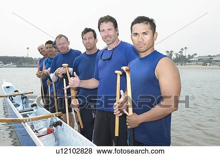 Outrigger canoeing team, group portrait View Large Photo Image Stock Photo - Outrigger canoeing team, group portrait. Fotosearch