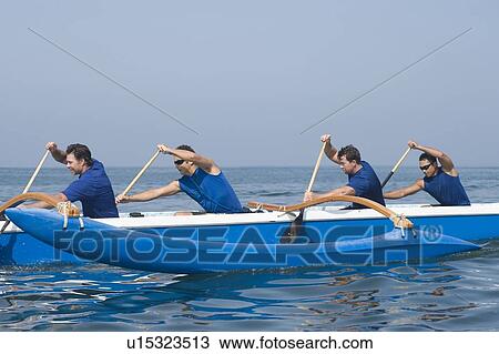 Outrigger canoeing team on water View Large Photo Image Stock Image - Outrigger canoeing team on water. Fotosearch