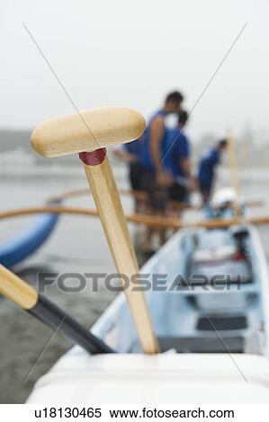 Sea kayak racing team prepare their boat View Large Photo Image Stock Photography - Sea kayak racing team prepare their boat. Fotosearch