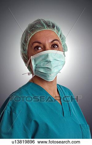 Theatre nurse in medical scrubs View Large Photo Image Stock Photograph - Theatre nurse in medical scrubs. Fotosearch