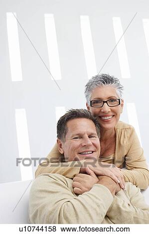 Affectionate couple at home, portrait View Large Photo Image Stock Photo - Affectionate couple at home, portrait. Fotosearch