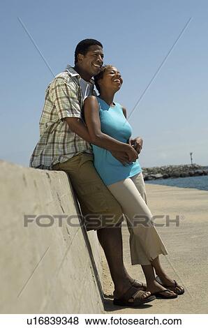 African American couple relaxing outside View Large Photo Image Stock Photo - African American couple relaxing outside. Fotosearch