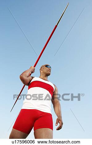 Athlete about to throw javelin, half length View Large Photo Image Stock Photograph - Athlete about to throw javelin, half length. Fotosearch