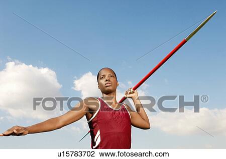 Athlete with javelin, half length View Large Photo Image Stock Image - Athlete with javelin, half length. Fotosearch