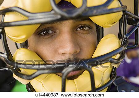 Baseball catcher wearing mask, (close-up), (portrait) View Large Photo Image Stock Photo - Baseball catcher wearing mask, (close-up), (portrait). Fotosearch