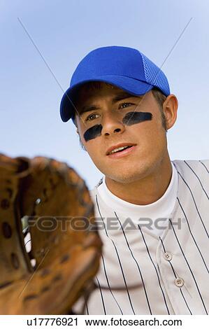 Stock Image - Baseball infielder playing. Fotosearch