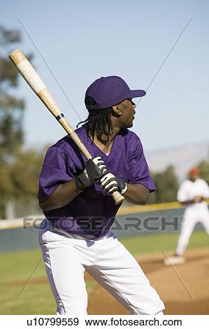 Baseball player at bat during game View Large Photo Image Stock Photo - Baseball player at bat during game. Fotosearch