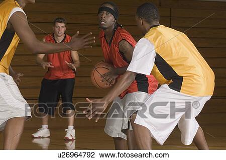Basketball match on indoor court View Large Photo Image Stock Image - Basketball match on indoor court. Fotosearch
