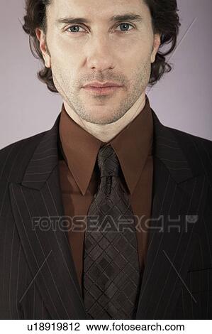 Stock Image - Businessman, close-up, portrait. Fotosearch