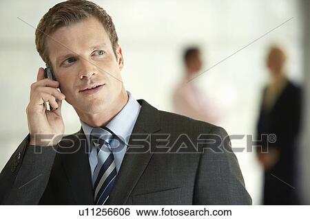 Businessman in Office Using Cell Phone, close-up View Large Photo Image Stock Photograph - Businessman in Office Using Cell Phone, close-up. Fotosearch