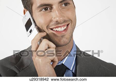 Businessman using mobile phone, close-up View Large Photo Image Stock Image - Businessman using mobile phone, close-up. Fotosearch