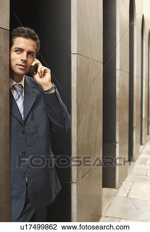 Businessman Using mobile phone. View Large Photo Image Stock Image - Businessman Using mobile phone.. Fotosearch
