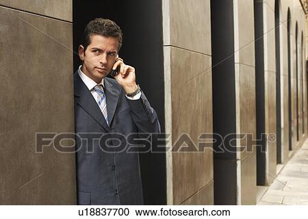 Businessman using mobile phone. View Large Photo Image Stock Image - Businessman using mobile phone.. Fotosearch