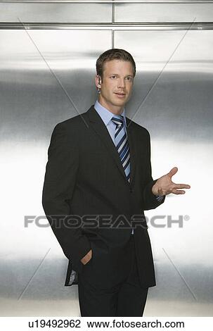 Businessman Using Wireless Headset View Large Photo Image Stock Image - Businessman Using Wireless Headset. Fotosearch