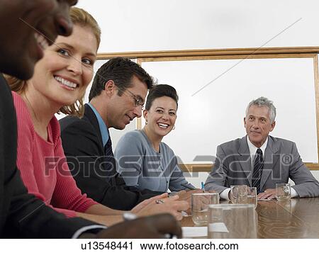 Businesspeople in conference meeting View Large Photo Image Stock Image - Businesspeople in conference meeting. Fotosearch