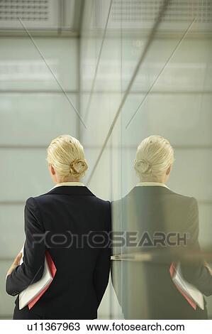 Businesswoman Leaning Against Glass Partition View Large Photo Image Stock Image - Businesswoman Leaning Against Glass Partition. Fotosearch
