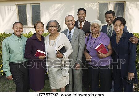 Christian Family on patio holding Bibles, portrait View Large Photo Image Stock Image - Christian Family on patio holding Bibles, portrait. Fotosearch