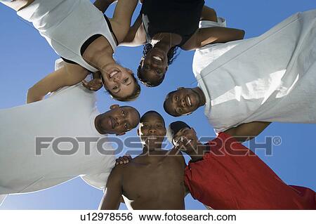Circle of Friends, view from below View Large Photo Image Stock Photograph - Circle of Friends, view from below. Fotosearch