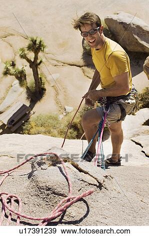 Climber with Ropes on Cliff View Large Photo Image Stock Photo - Climber with Ropes on Cliff. Fotosearch
